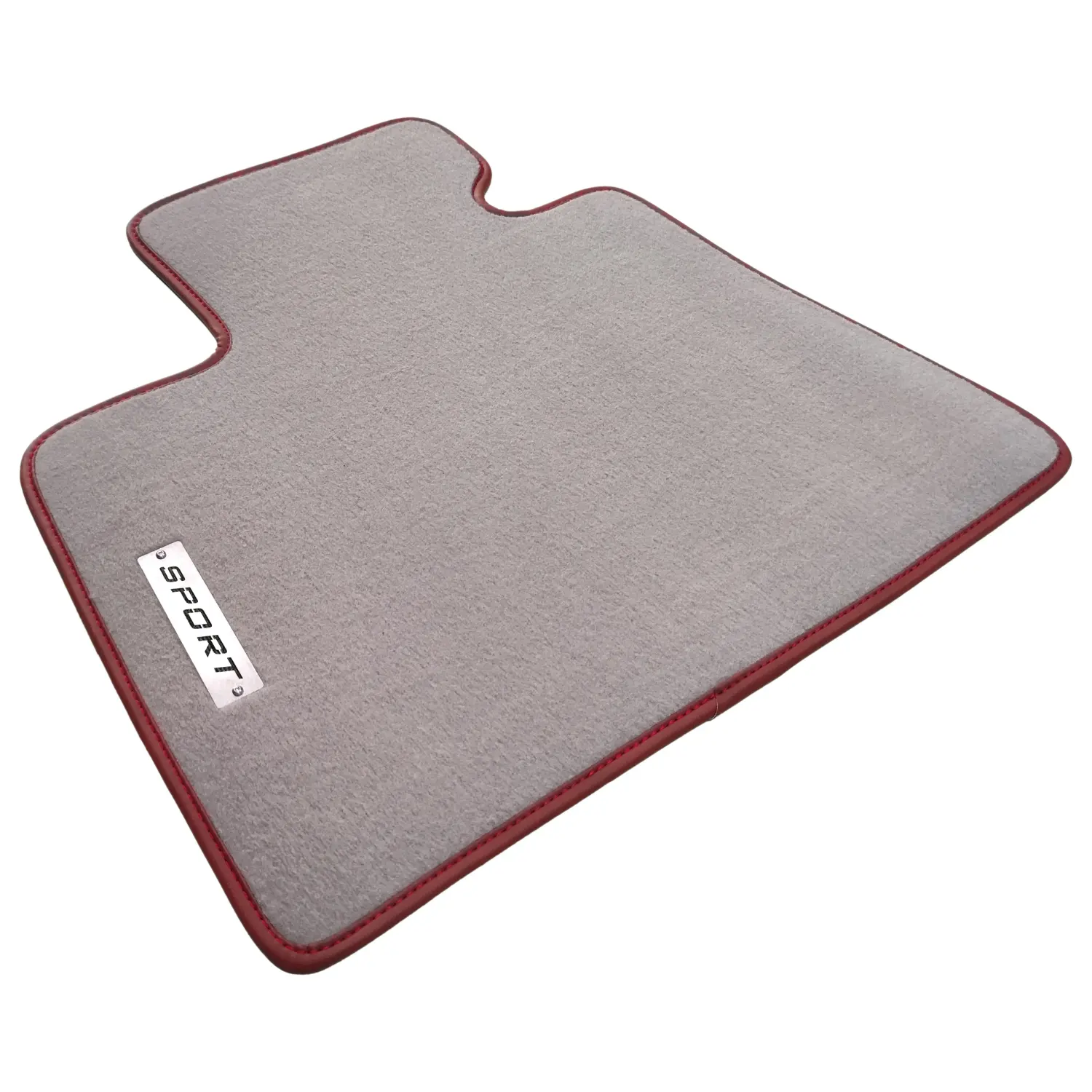 BMW X7 G07 için lüks açık gri kadife paspas detayı, metal Sport logolu.